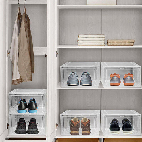 Shoe storage boxes stacked inside a wardrobe holding trainers and shoes