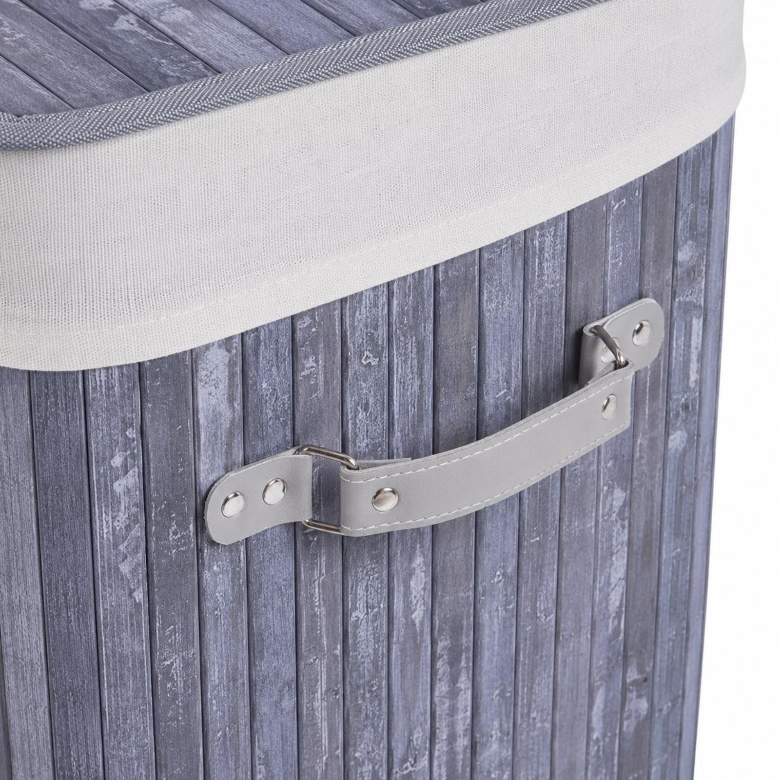 Close-up of a grey wooden laundry hamper with a grey fabric liner, a light grey handle against a white background.