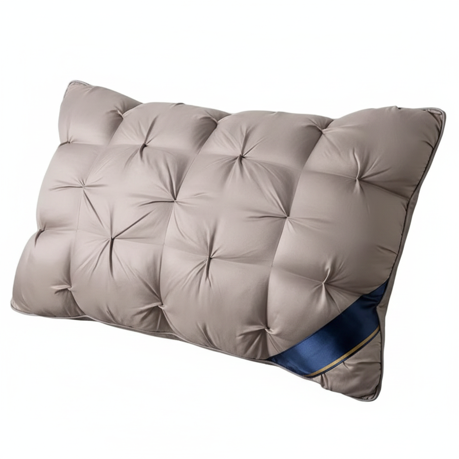 A rectangular tufted pillow in a taupe-beige color, featuring a decorative blue and gold striped accent panel on one corner, shown against a plain white background.